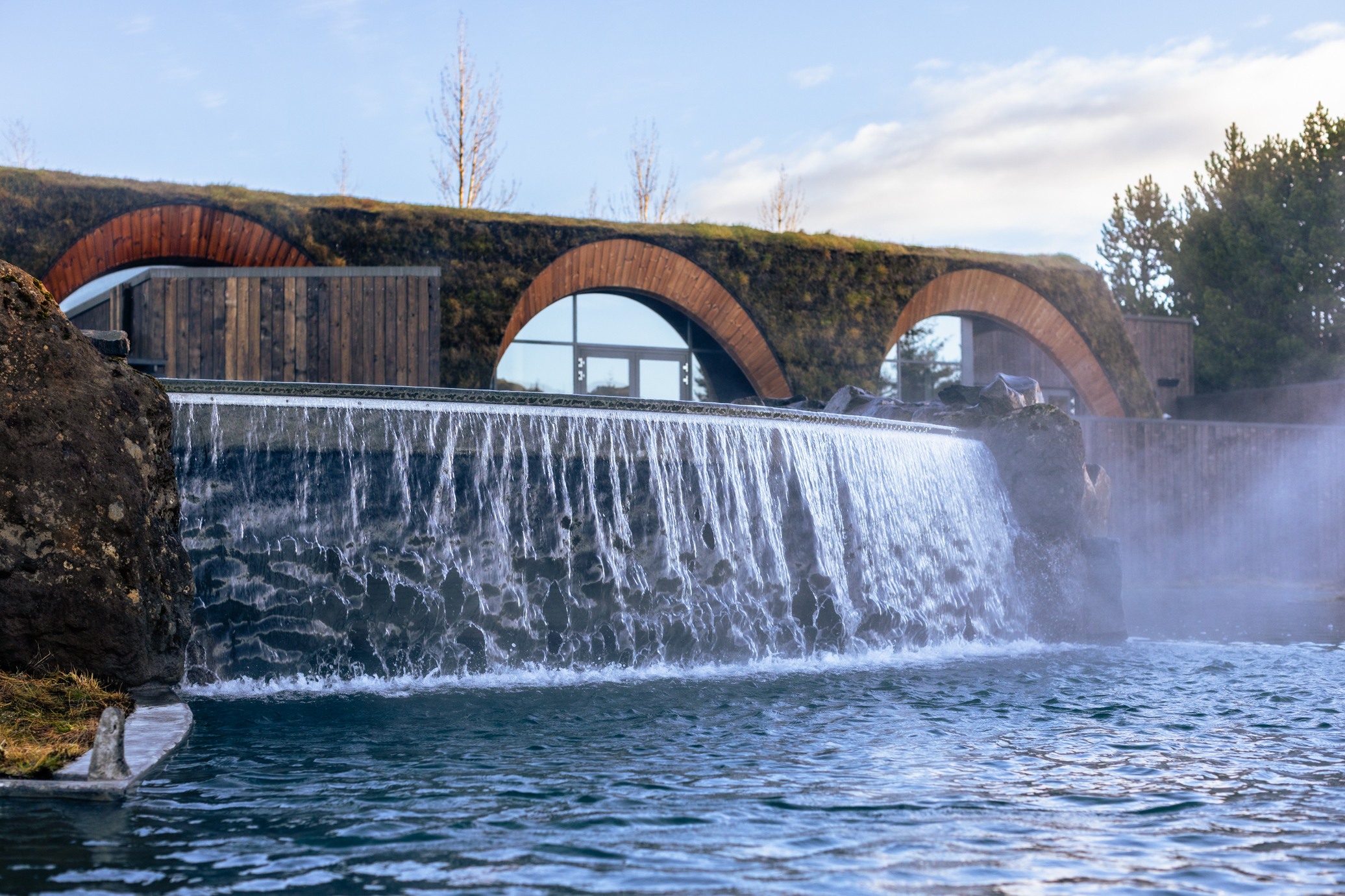 Waterfall view from Laugaras Lagoon in summertime