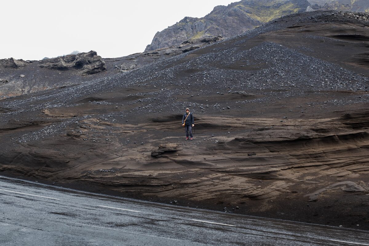 Man Walking At Reykjanes Peninsula in iceland