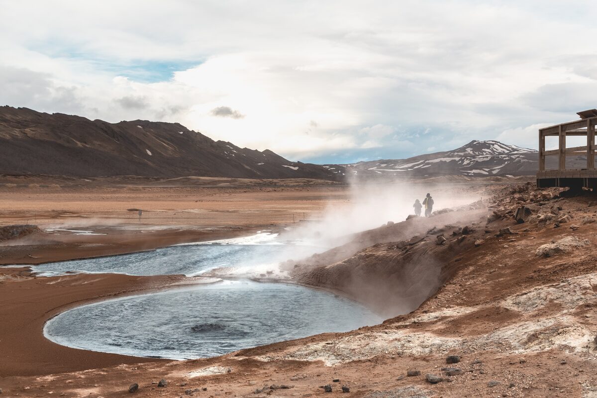 Tourists And Water Pools At Hverir Geothermal Area in iceland