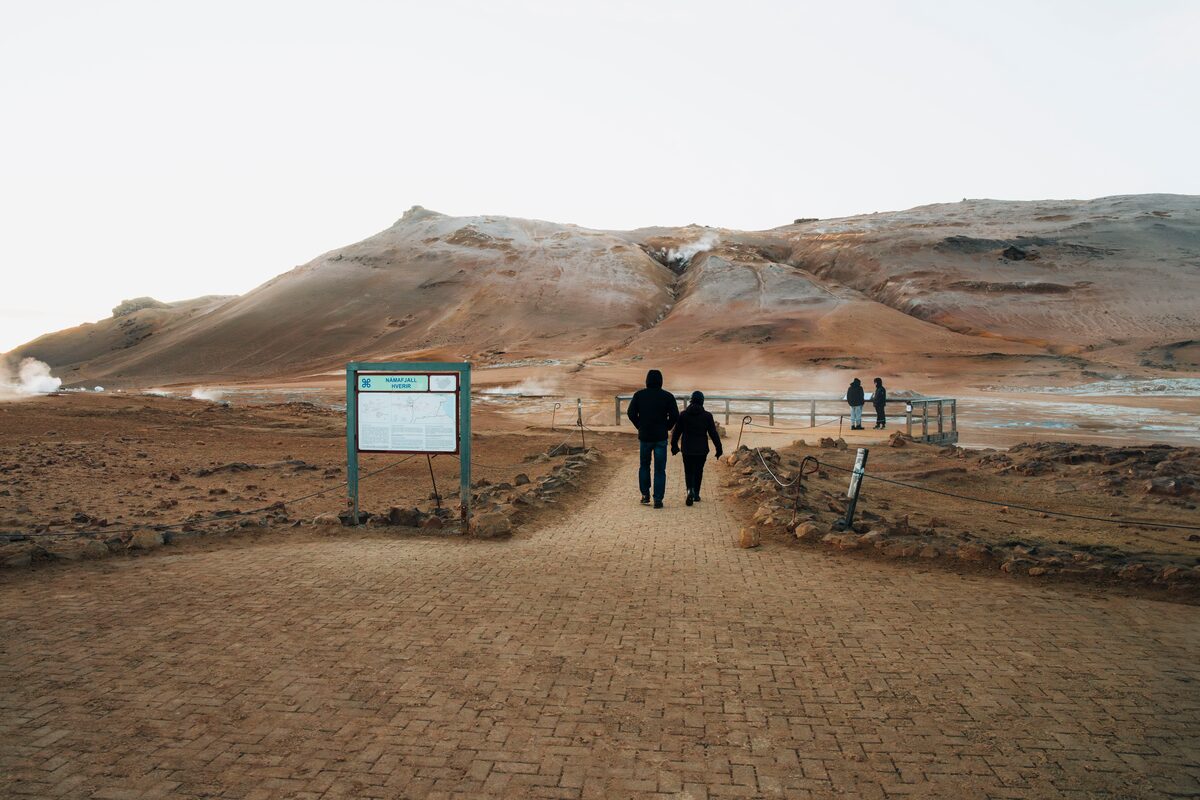Tourists Walking At Hverir Area in iceland