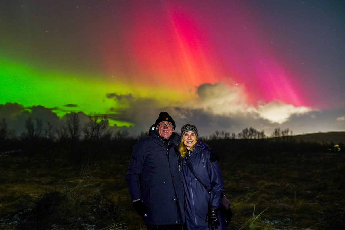 Older Couple Under Northern Lights in iceland