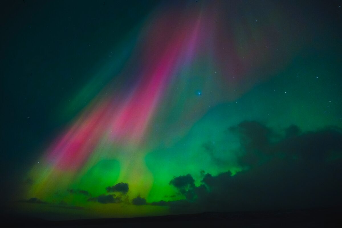 Pink And Green Northern Lights In The Sky in iceland
