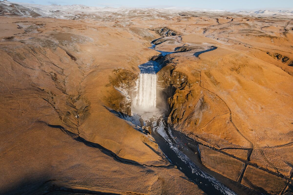 A powerful view of the Skógafoss waterfall in Iceland from above.