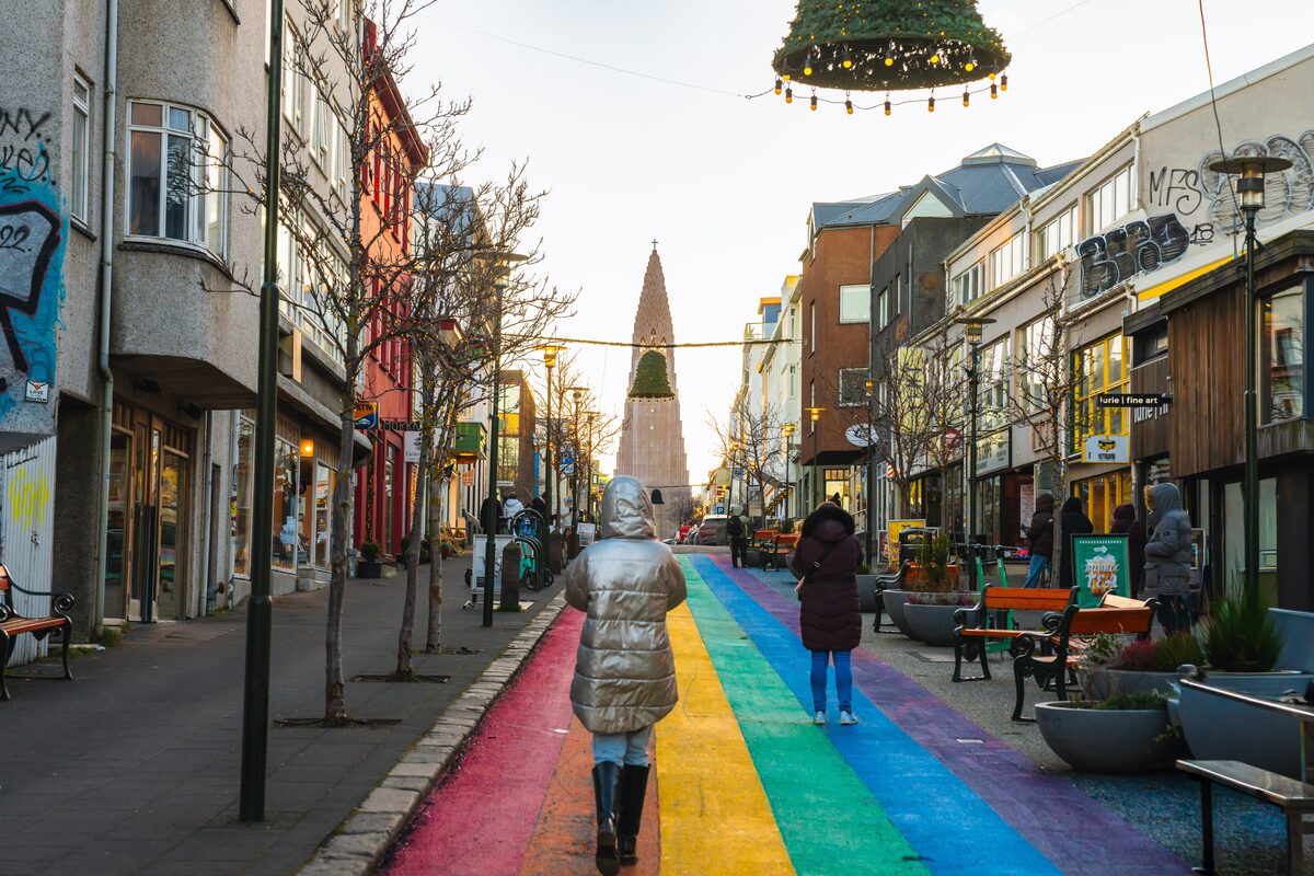 Rainbow-painted Skólavörðustígur leading toward Hallgrímskirkja church in central Reykjavík.