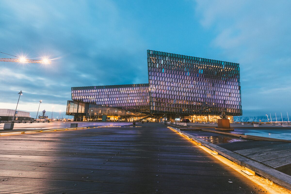 Harpa Concert Hall in Reykjavik under an evening sky.