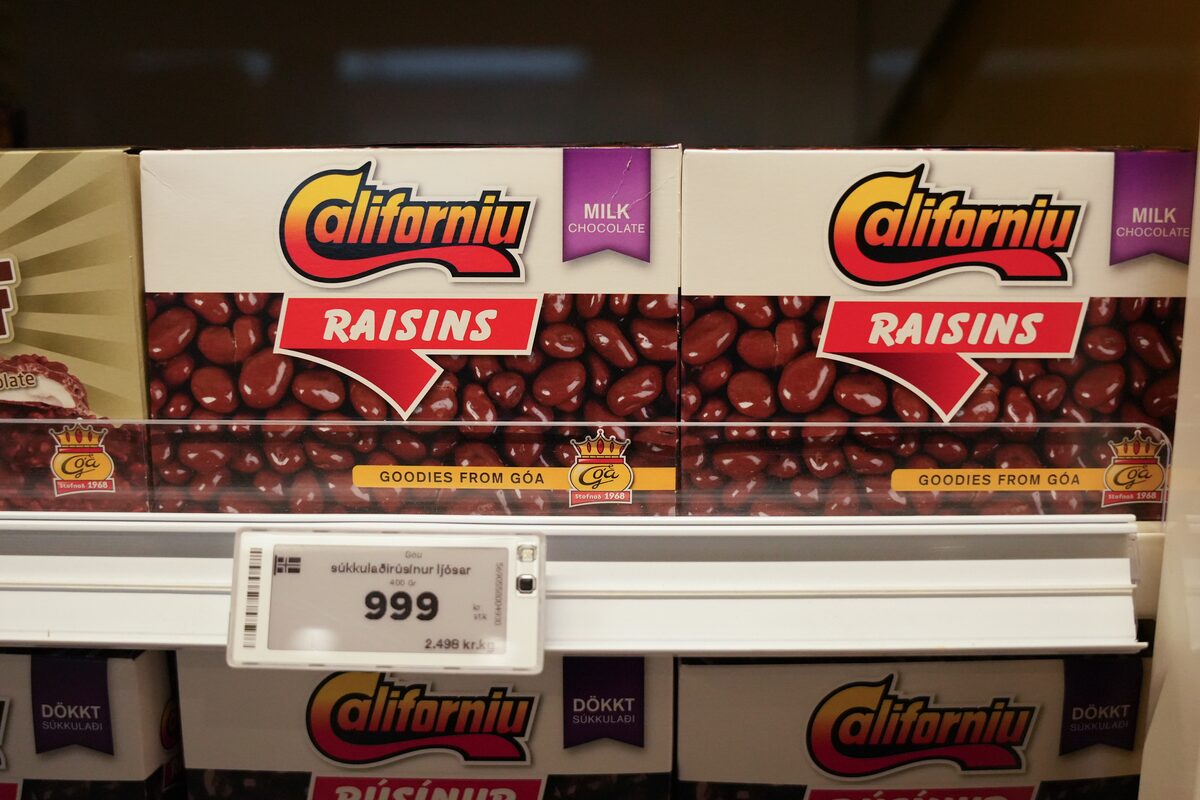 Boxes of Icelandic chocolate-covered raisins on a store shelf.