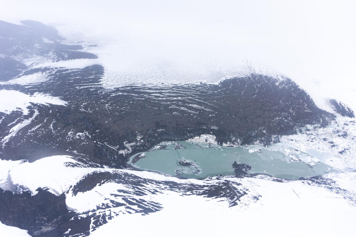 Aerial view of a meltwater lake in Grímsvötn's ice-covered caldera inside the Vatnajökull ice cap.