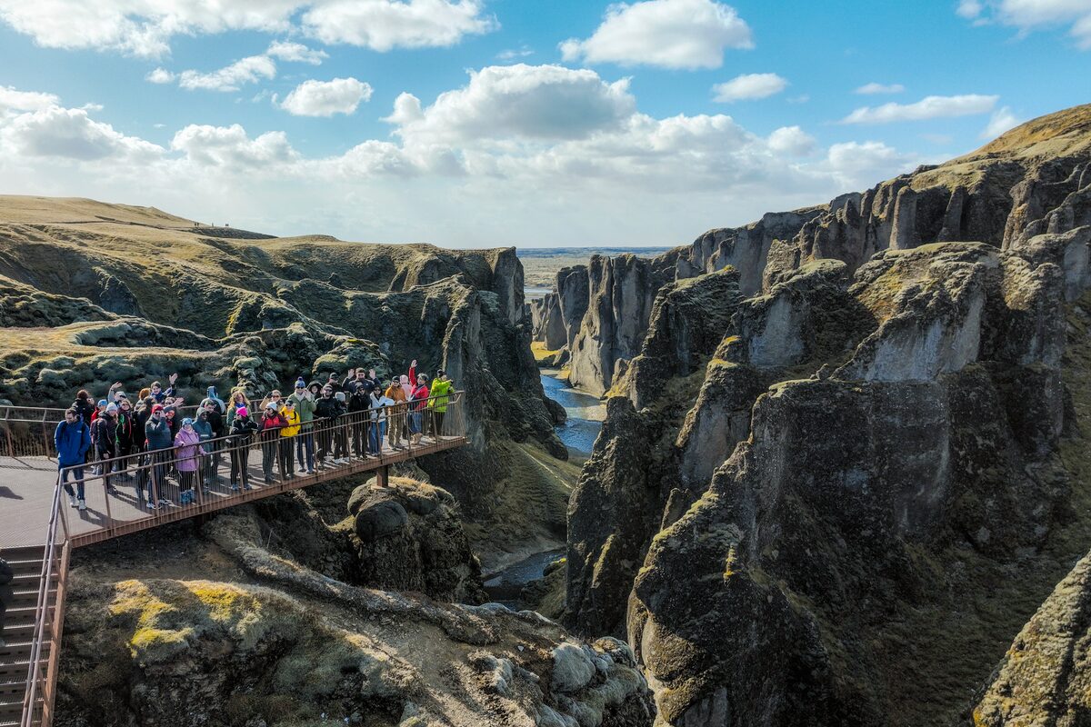 FAM trip group on the viewing platform at Fjaðrárgljúfur canyon, South Iceland.