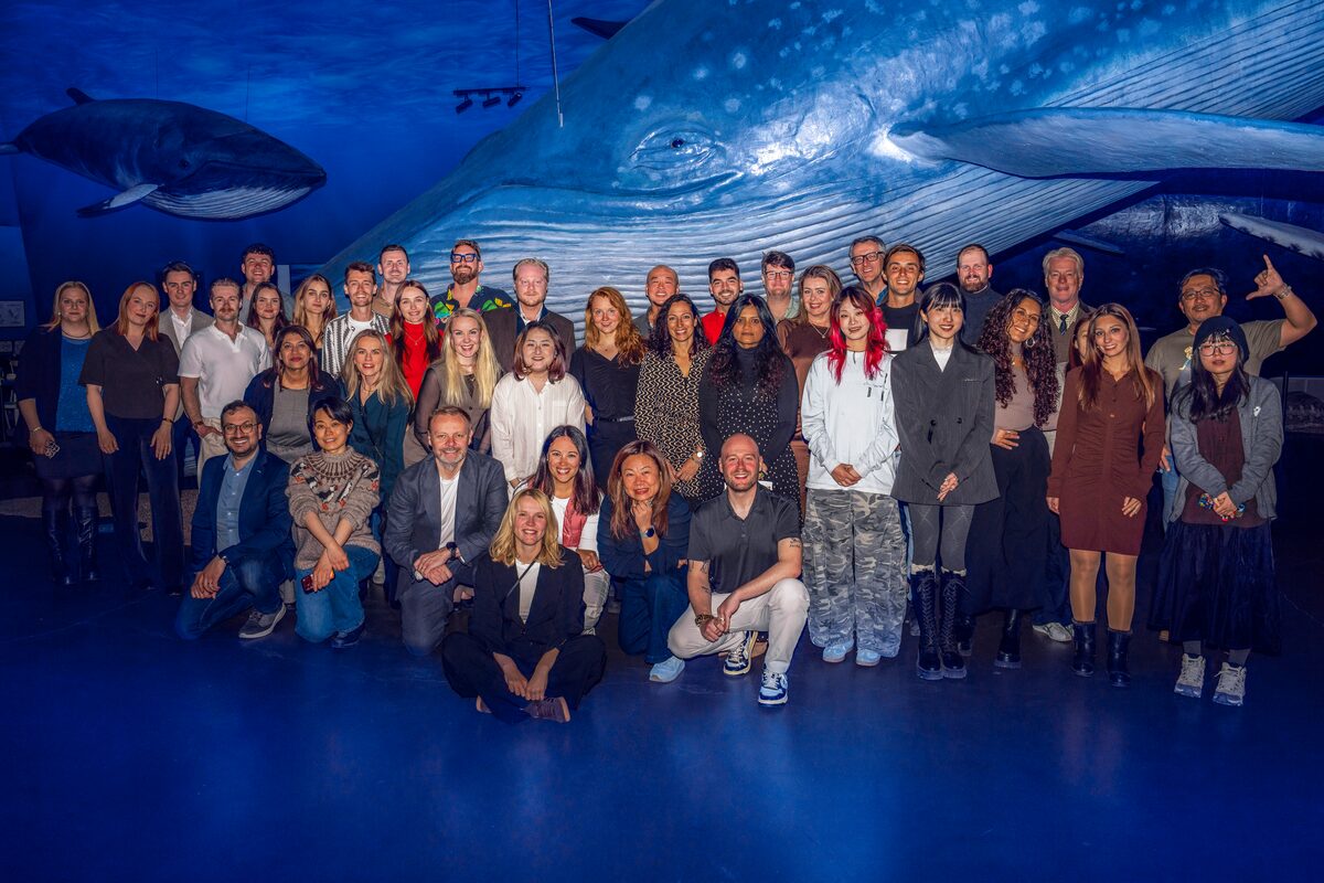 Arctic Adventures FAM trip group photo at whales of Iceland museum.