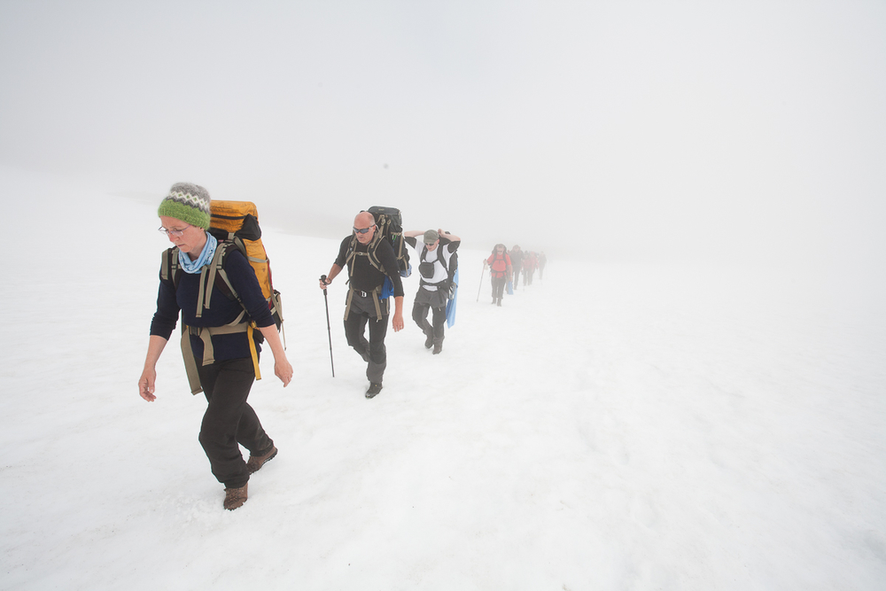 People Hiking On Snow With Bad Visibility in Iceland