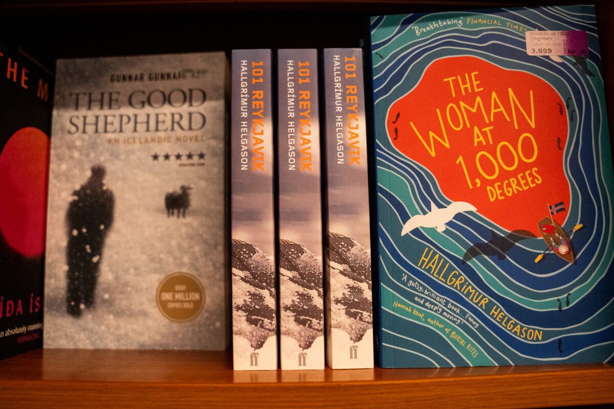 A bookshelf of Icelandic novels in English, including The Good Shepherd and The Woman at 1000 Degrees.
