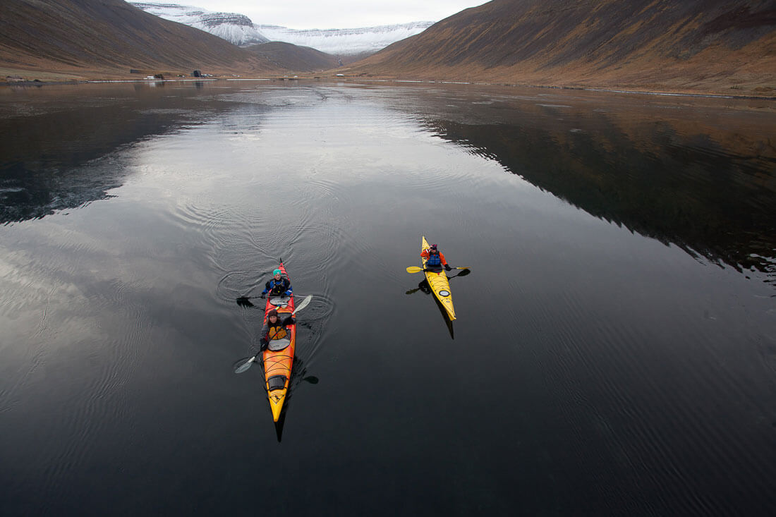 Two Kayaks In Water Between Mountains in Iceland