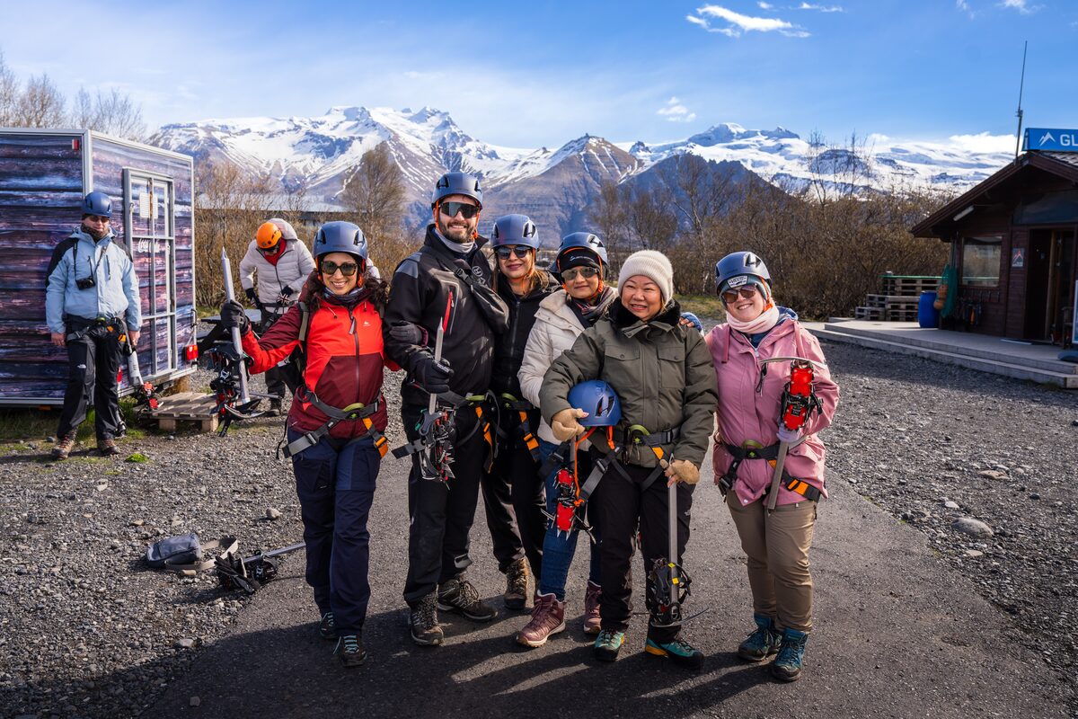 Smilling Group Of People Getting Ready For A Glacier Hike in Iceland