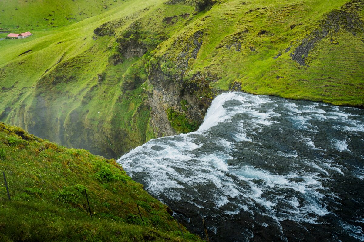Aerial view of the Skógá river cutting through a deep gorge.