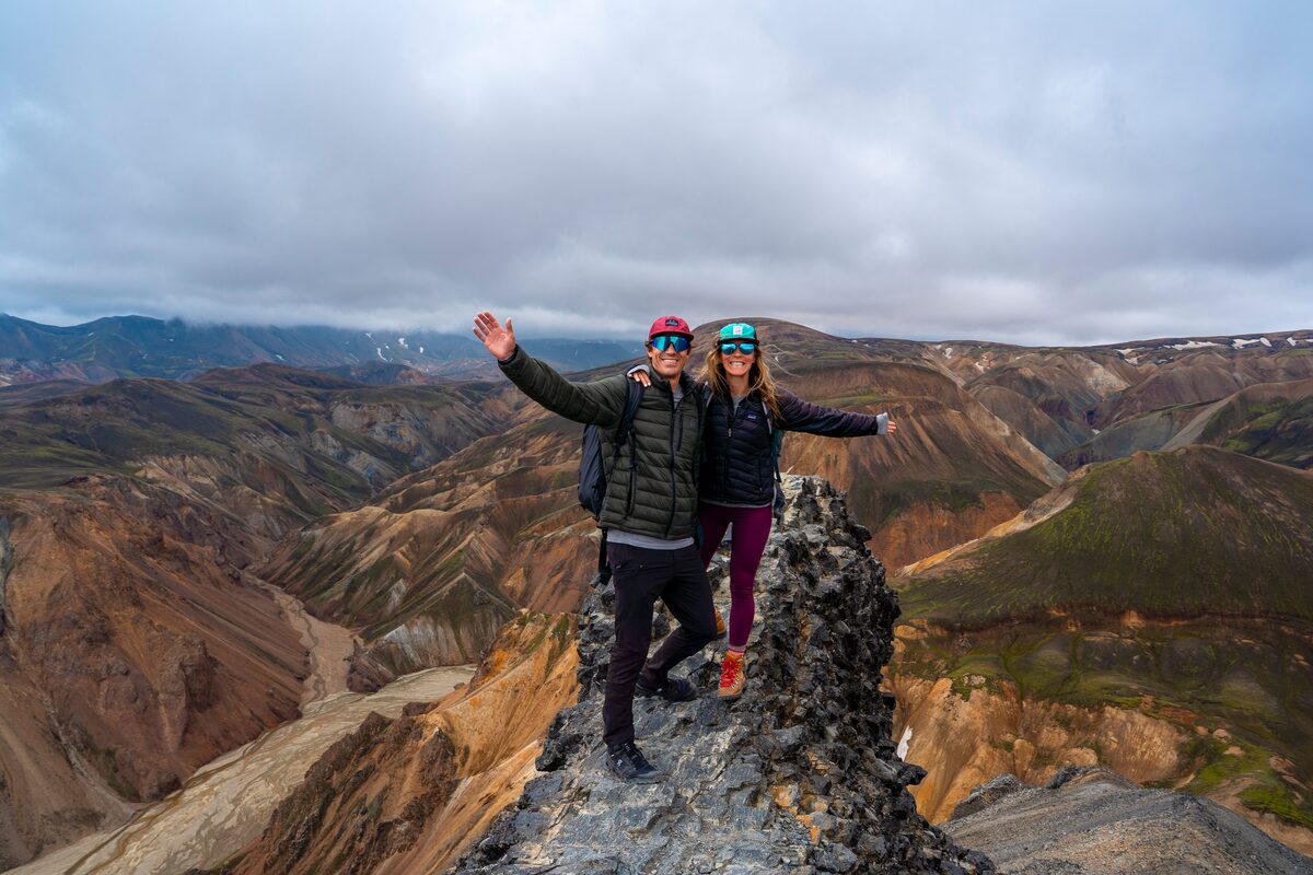 Couple On A Rock At Landmannalaugar Hiking Trail in Iceland
