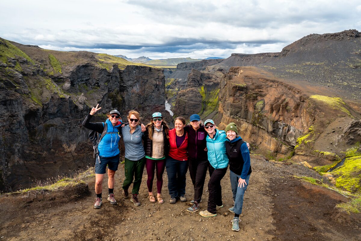 Group Of Women Posing For A Picture During A Hike At Landmannalaugar in Iceland