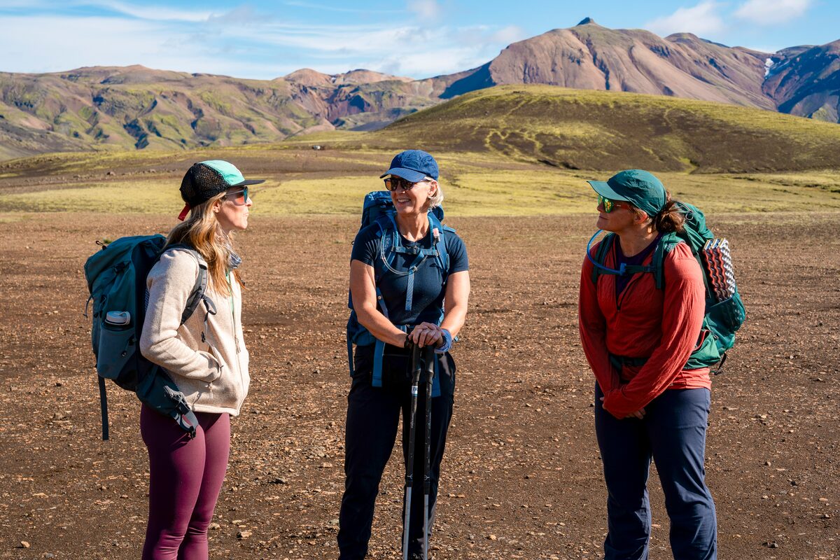 Three Women Talking During A Hike At Landmannalaugar in Iceland