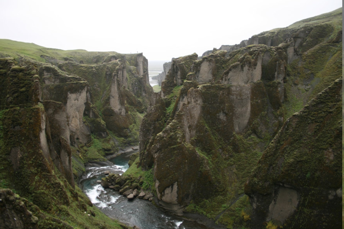 Fjadrargljufur moss covered canyon viewpoint.