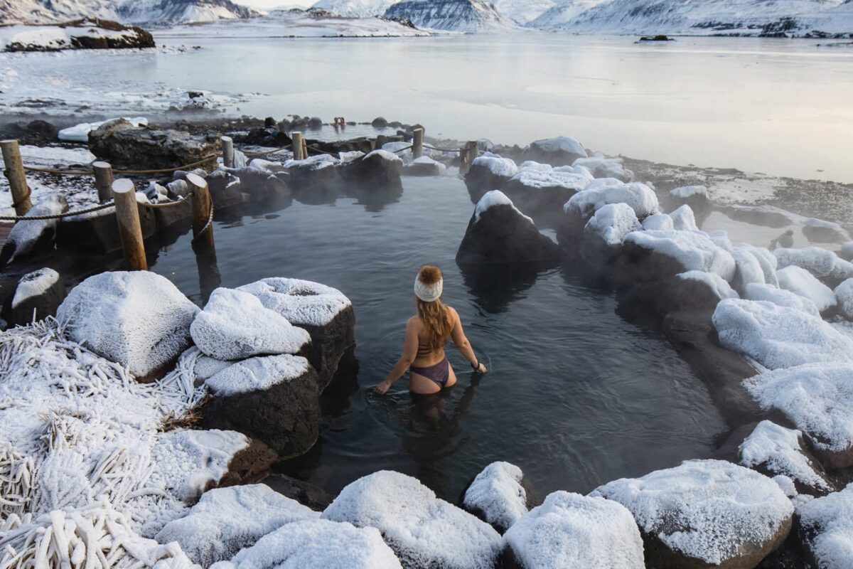 Woman In A Winter Hat At Hvammsvik Hot Springs In Winter in Iceland