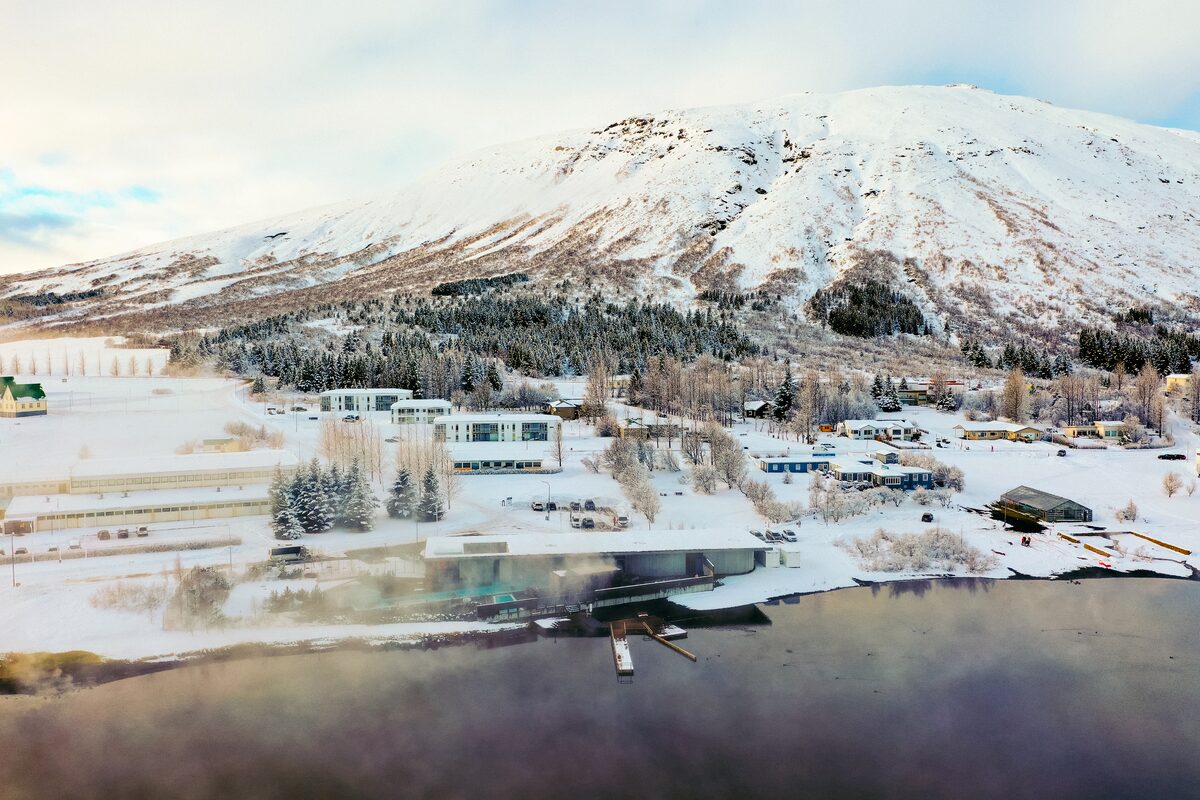 Laugarvatn Fonatana Spa In Winter With A Mountain Behind in Iceland