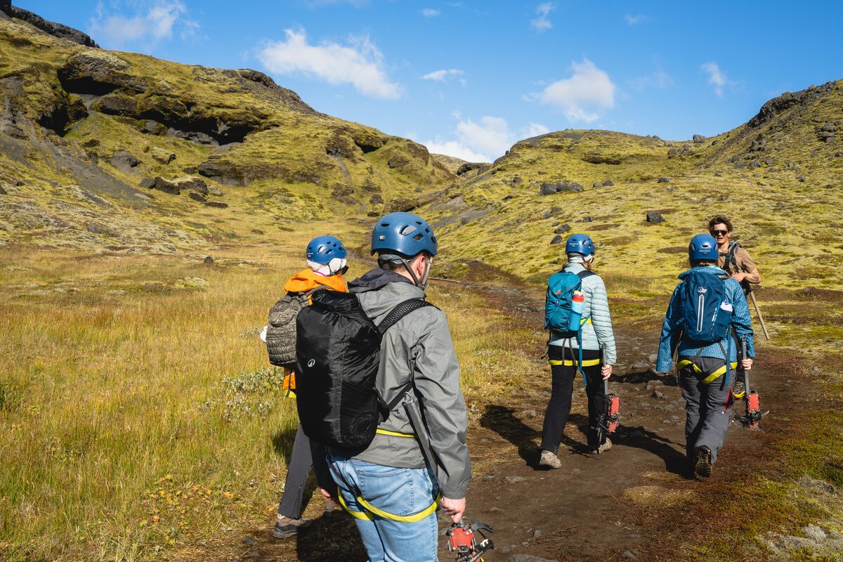 Small Group Walking Solheimajokull Glacier Route with blue skies 