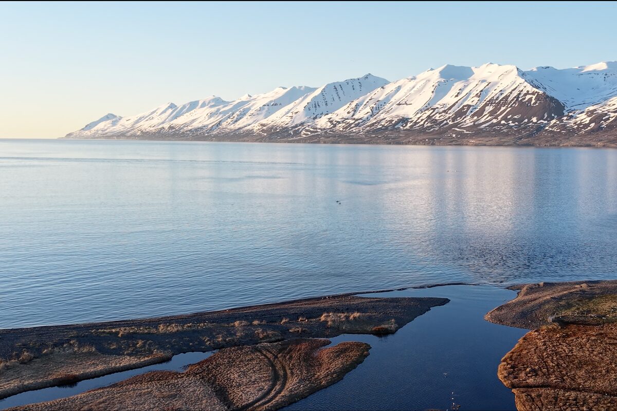 View Of A Sea And Snowy Mountains in Iceland