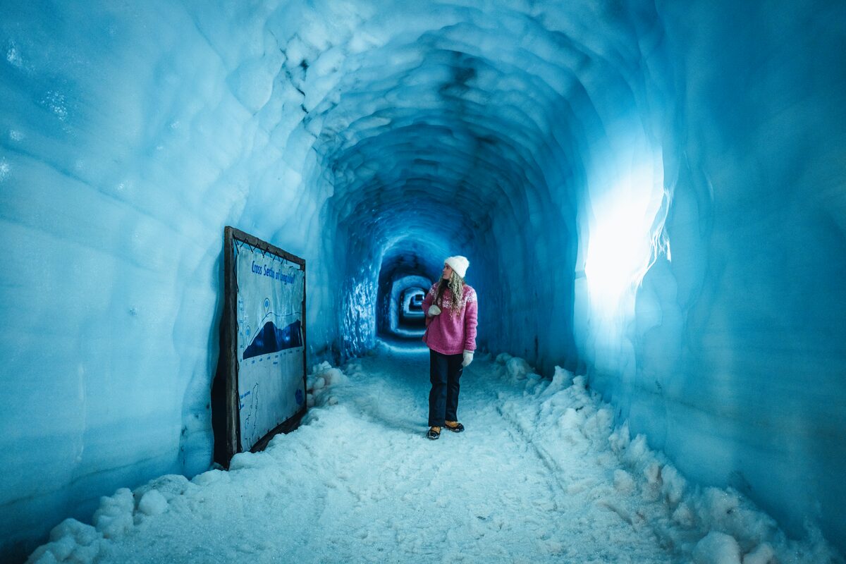 Woman In A Pink Sweater At Into The Glacier in Iceland