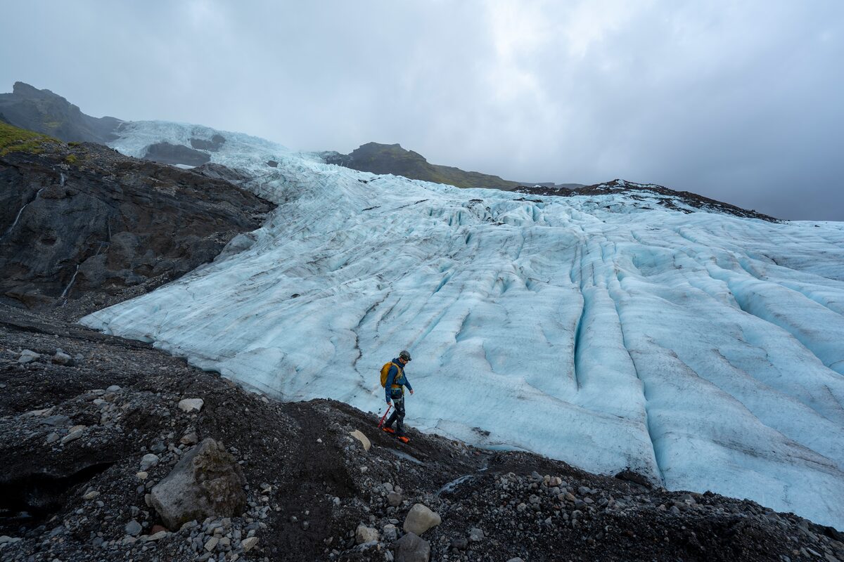 Person Walking On Falljokull Glacier During A Hike in Iceland