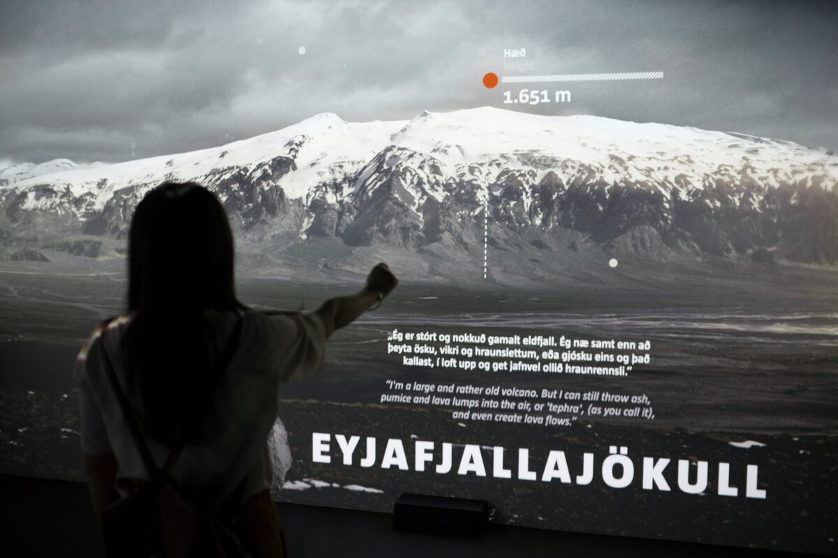 Girl Interacting With An Instilation At Lava Centre in Iceland