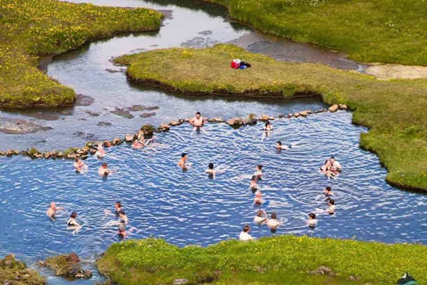 people bathe in hot spring at Landmannalaugar