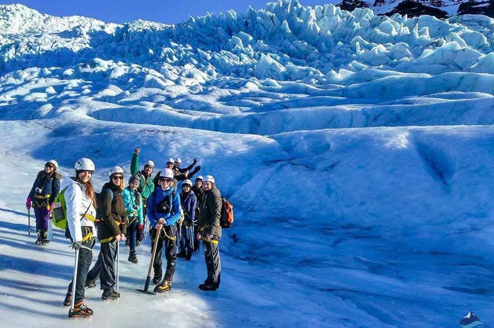 happy people on glacier hiking tour