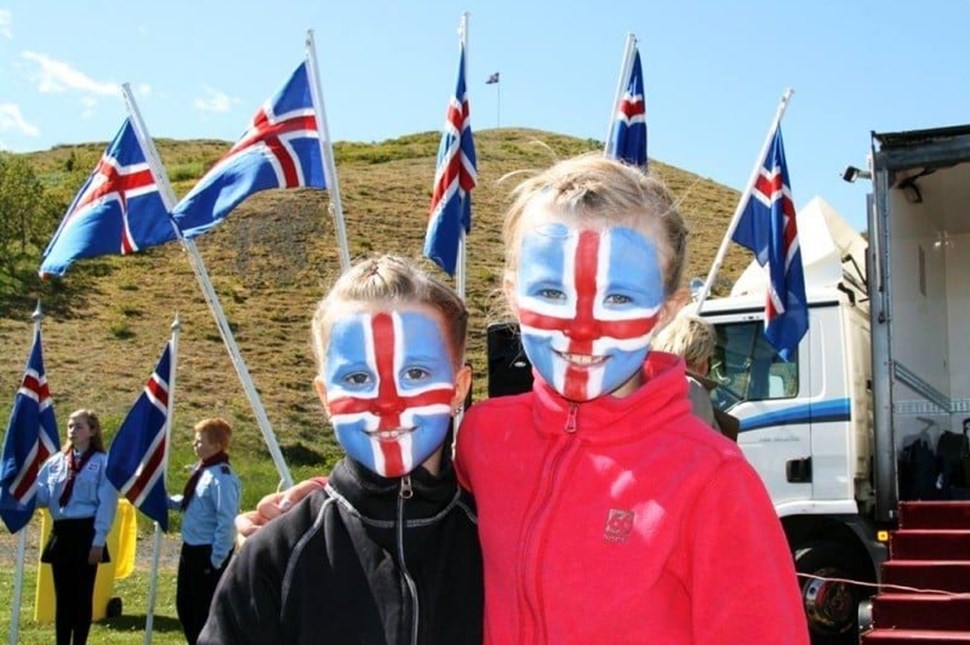 Kids with face painted Flag Iceland
