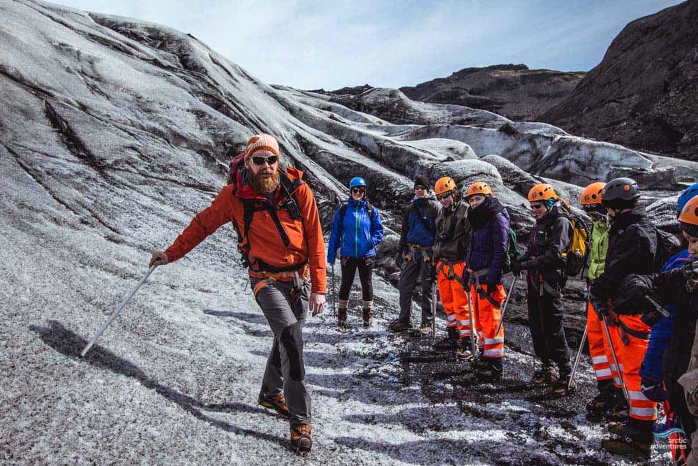 glacier hiking guide instruct people 