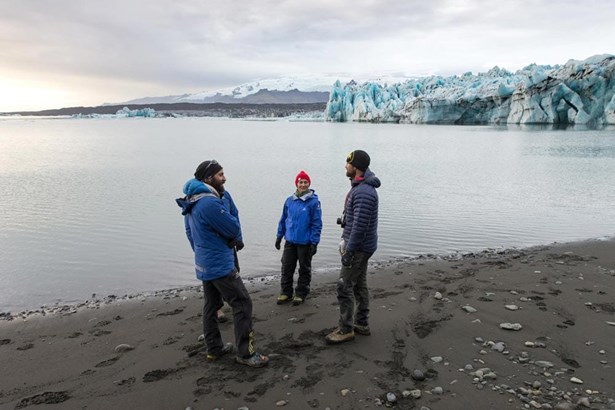 explorers at the beach near Vatnajokull glacier 