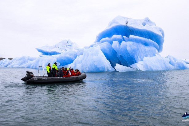 people having a boat tour in Iceland