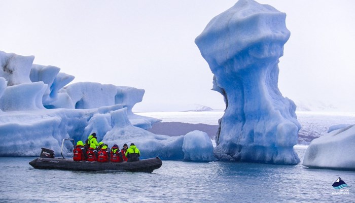 boat tour near huge icebergs in Iceland