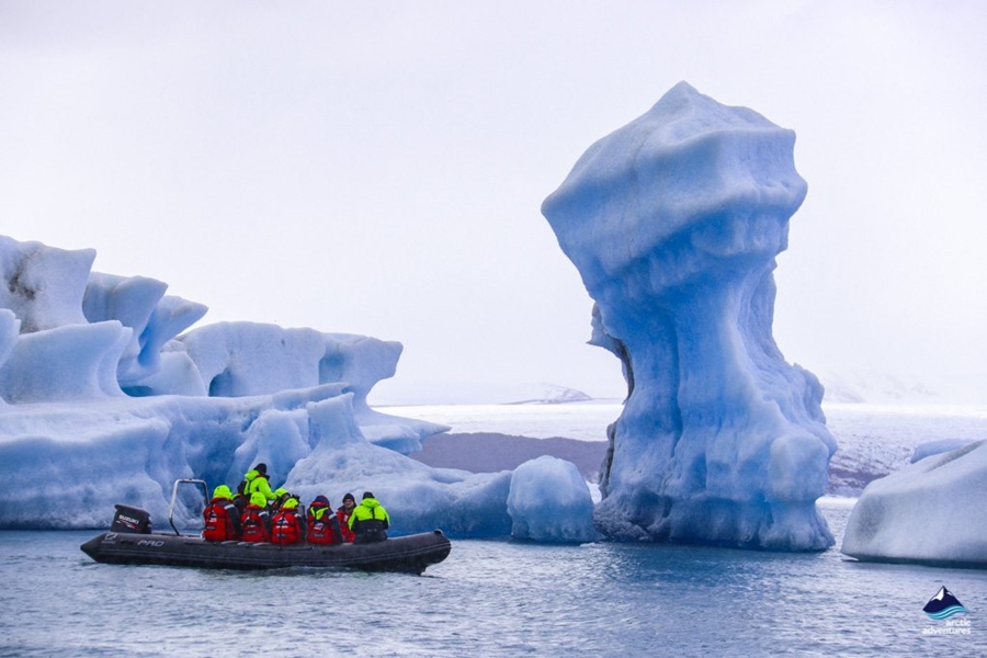 boat tour near huge icebergs
