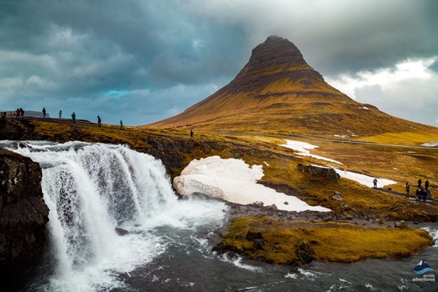 A view of Kirkjufell, Iceland’s most photographed mountain and its nearby waterfall