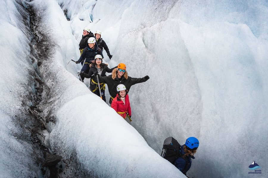 happy explorers on a glacier