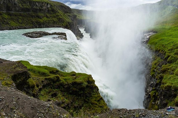 Gullfoss waterfall surrounded by mountains