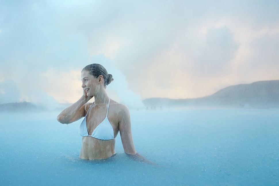 woman bathe in Icelandic blue lagoon