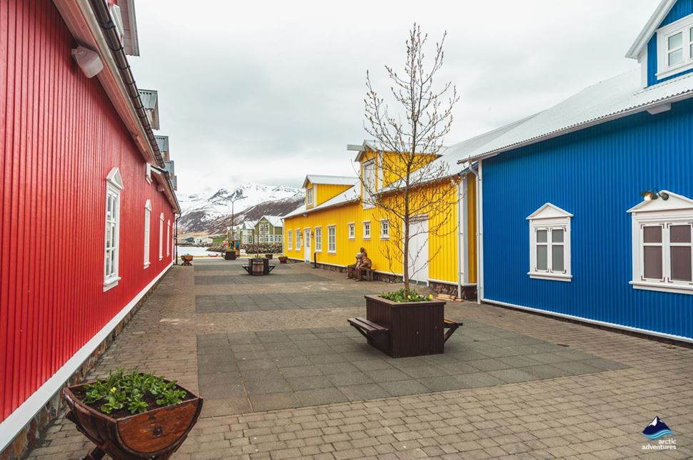Yellow and blue houses at Siglufjordur Harbor