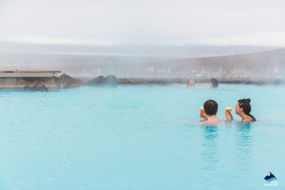 couples bathing at Myvatn nature pool in Iceland
