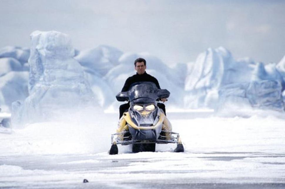 James Bond riding snowmobile in Iceland